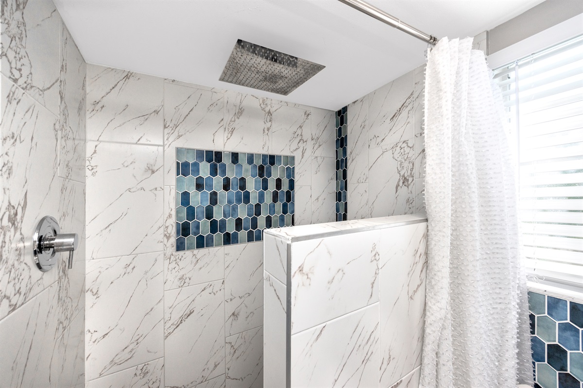 Step In Shower In Primary Bedroom's Bathroom