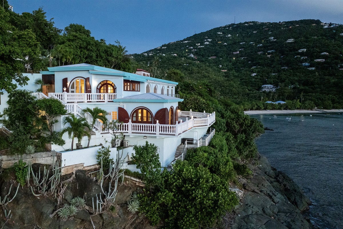 Perched just above the ocean below and walking distance to Hull Bay!