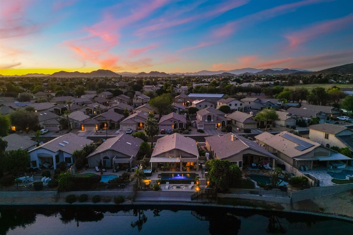 Situated right on the lake with mountain views on the horizon, this home offers the kind of setting that makes guests extend their stays.