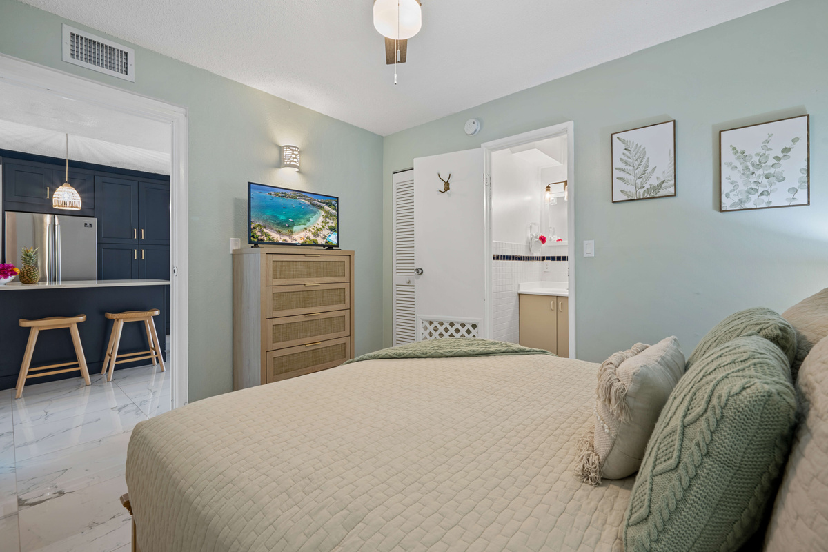 A welcoming guest bedroom designed for a relaxing night's sleep.