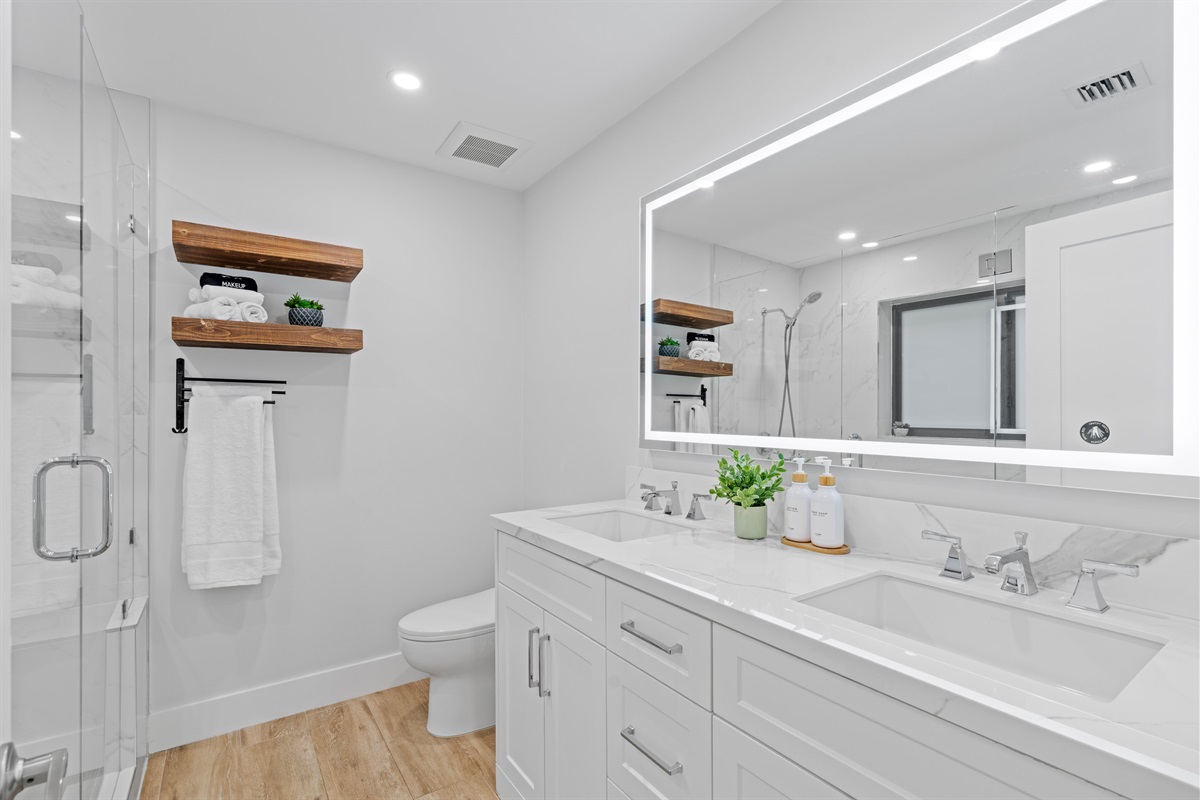 Refreshing Walk-In Showers with Rainfall Heads and Glass Doors