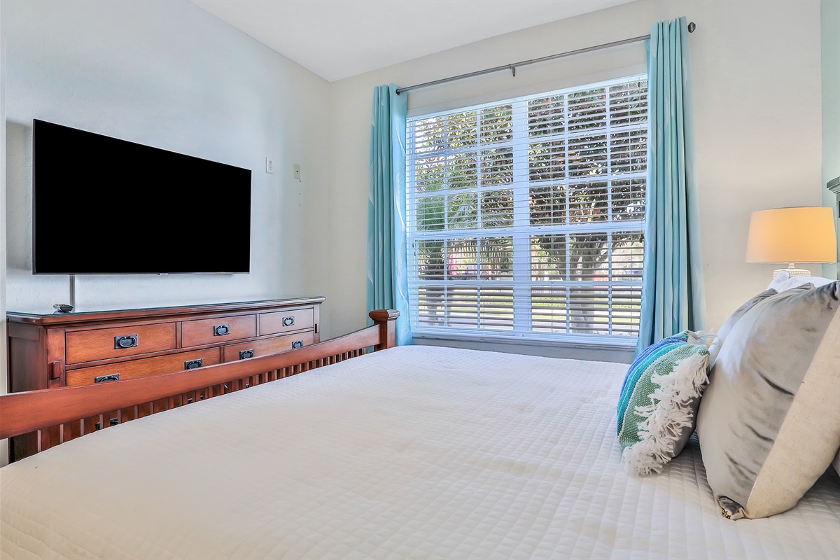 Second King suite bedroom with 55" TV. Now with luxury vinyl flooring.