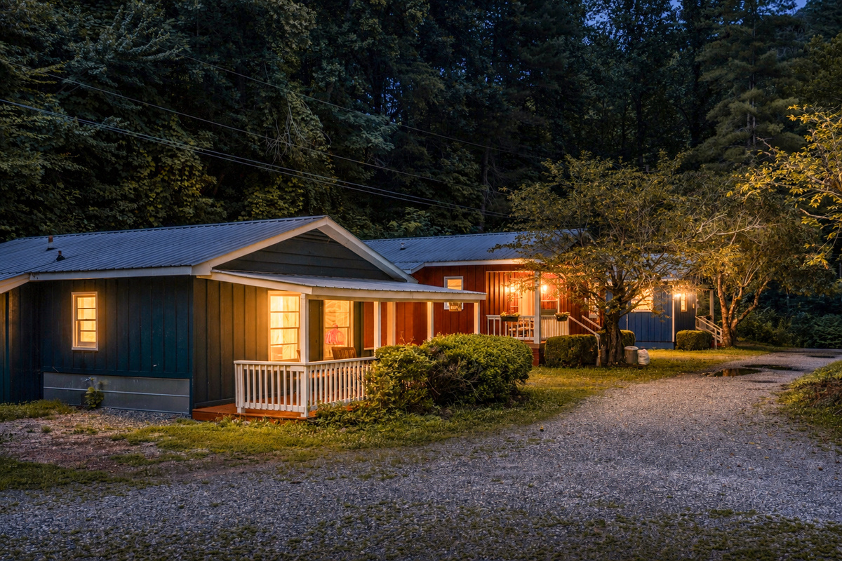 Charming Retreat: Experience mountain nights amidst vibrant, inviting cabin exteriors!