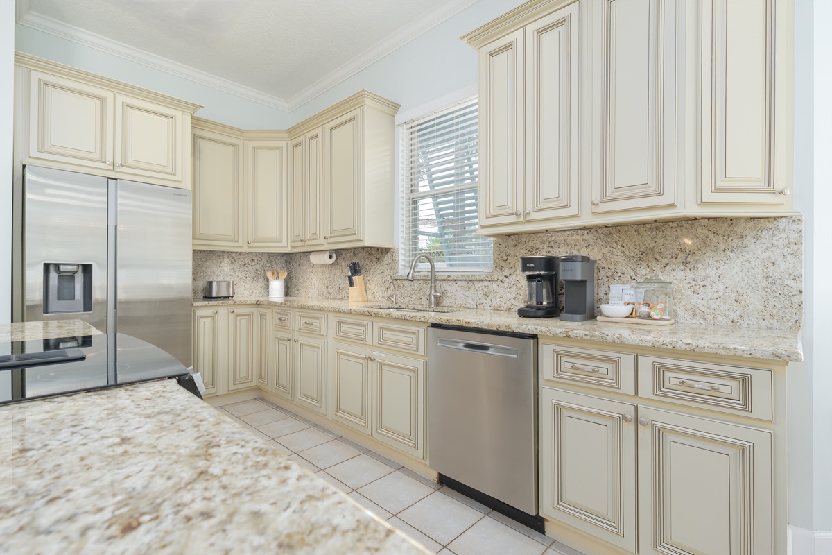 Light-filled kitchen with beautiful cabinetry and plenty of counter space