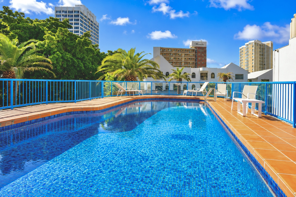 Cool off in the outdoor pool, then settle poolside with palms, sunshine and the Surfers Paradise skyline around you.