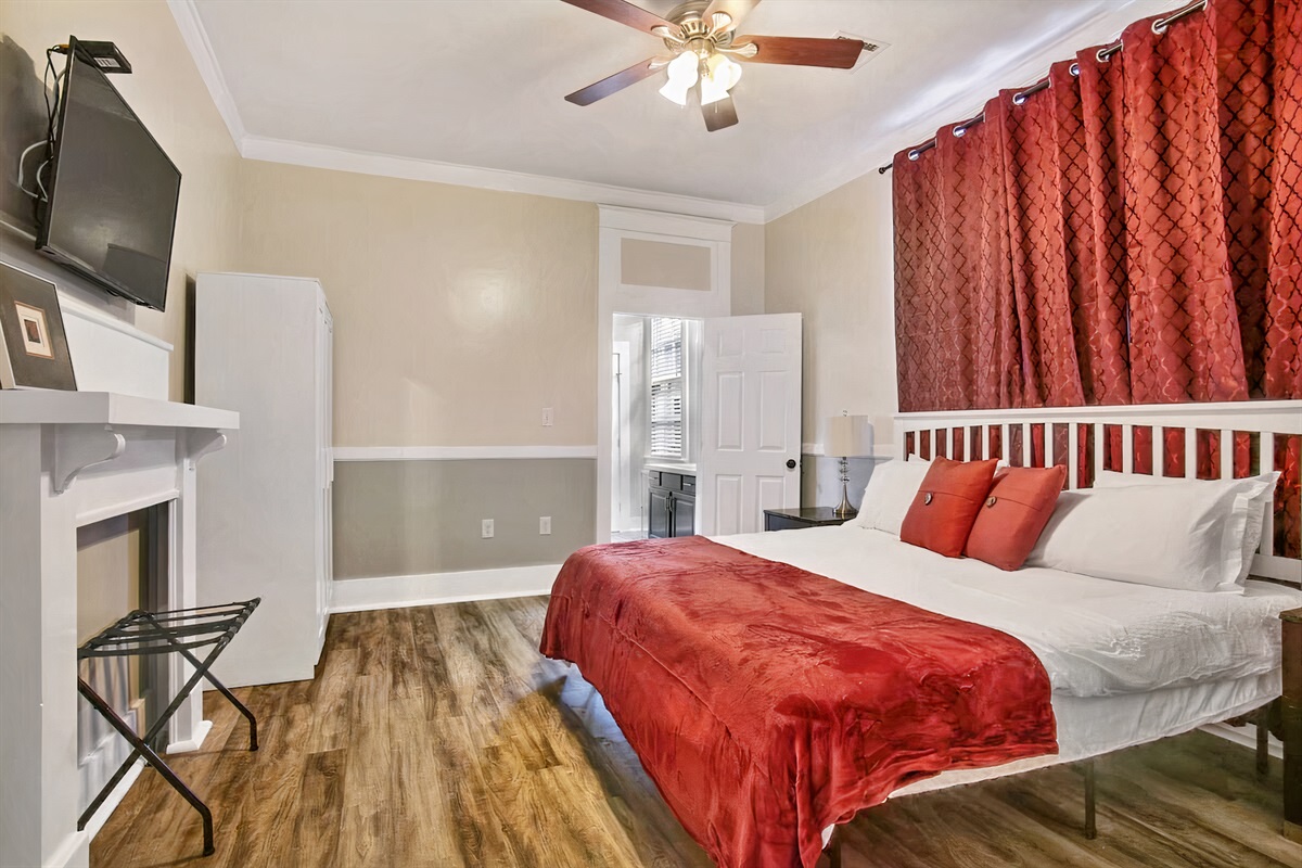 Bedroom 2. 1 king bed, blackout curtains, 39" smart tv, armoire. Jack & Jill bathroom.