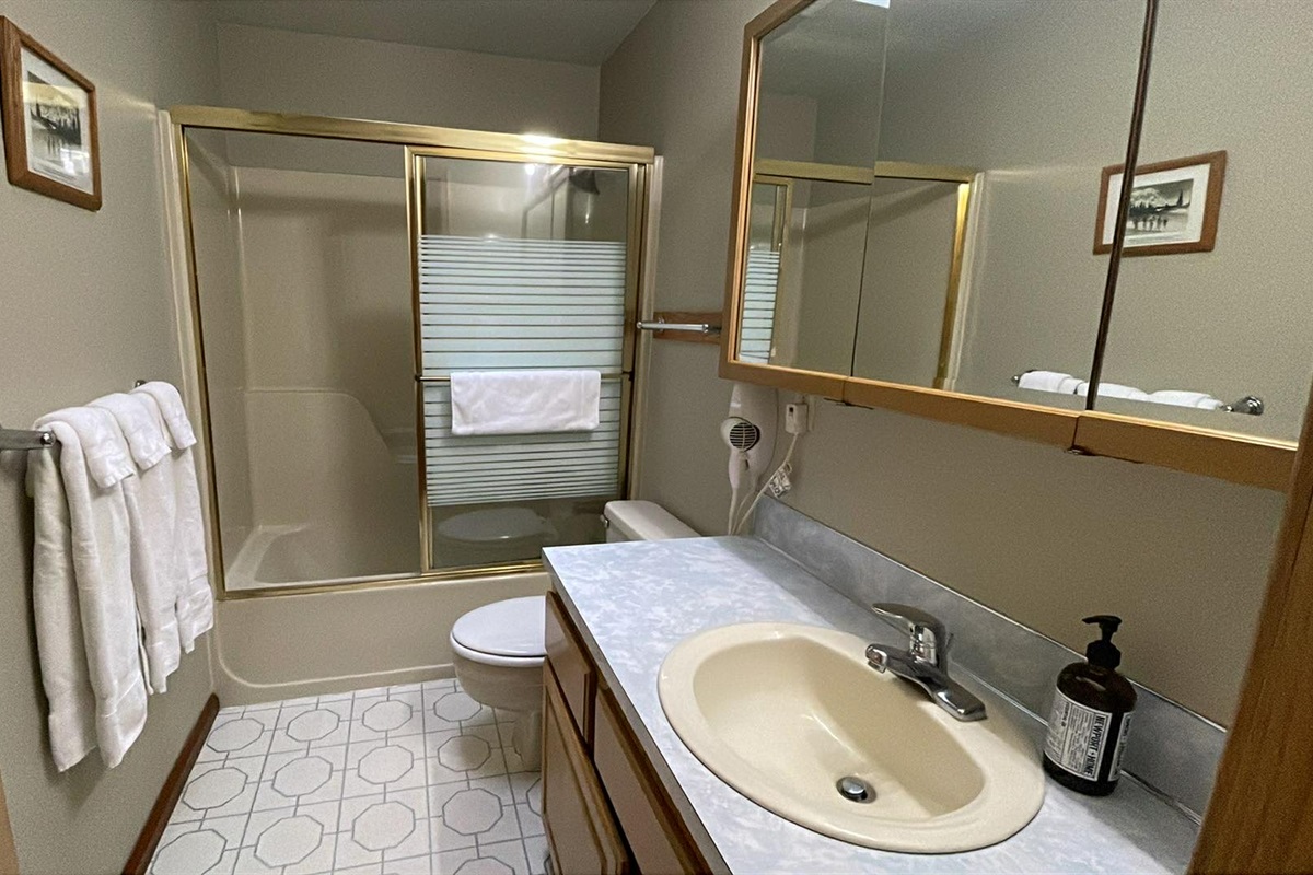 Second Bathroom via Hallway (Please review the House Rules regarding number of guests and access to the second bedroom and second bathroom.)