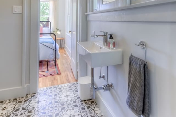 Bathroom, door to each bedroom