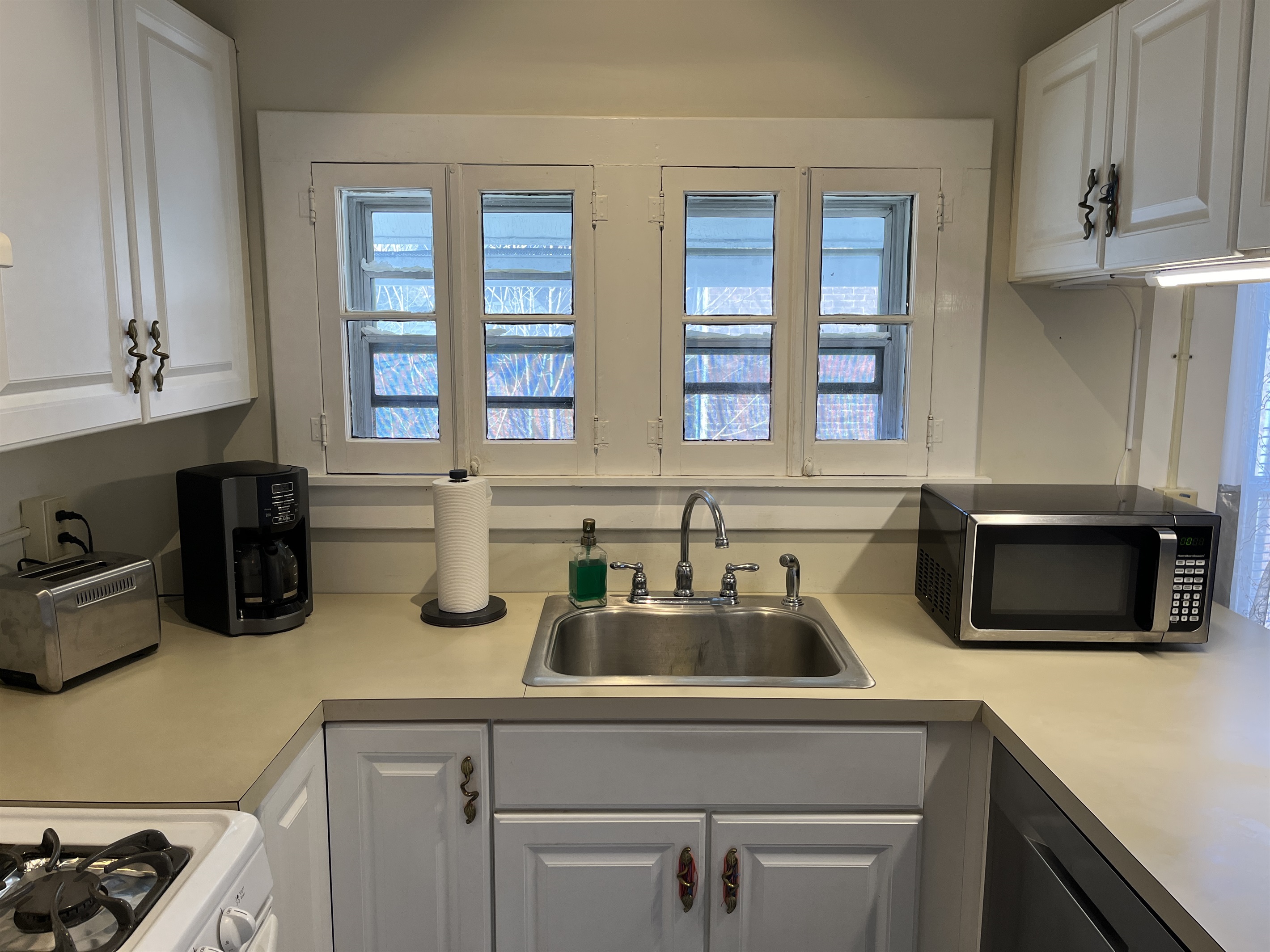 All the necessities, fridge, coffee pot, microwave, dishwasher and more