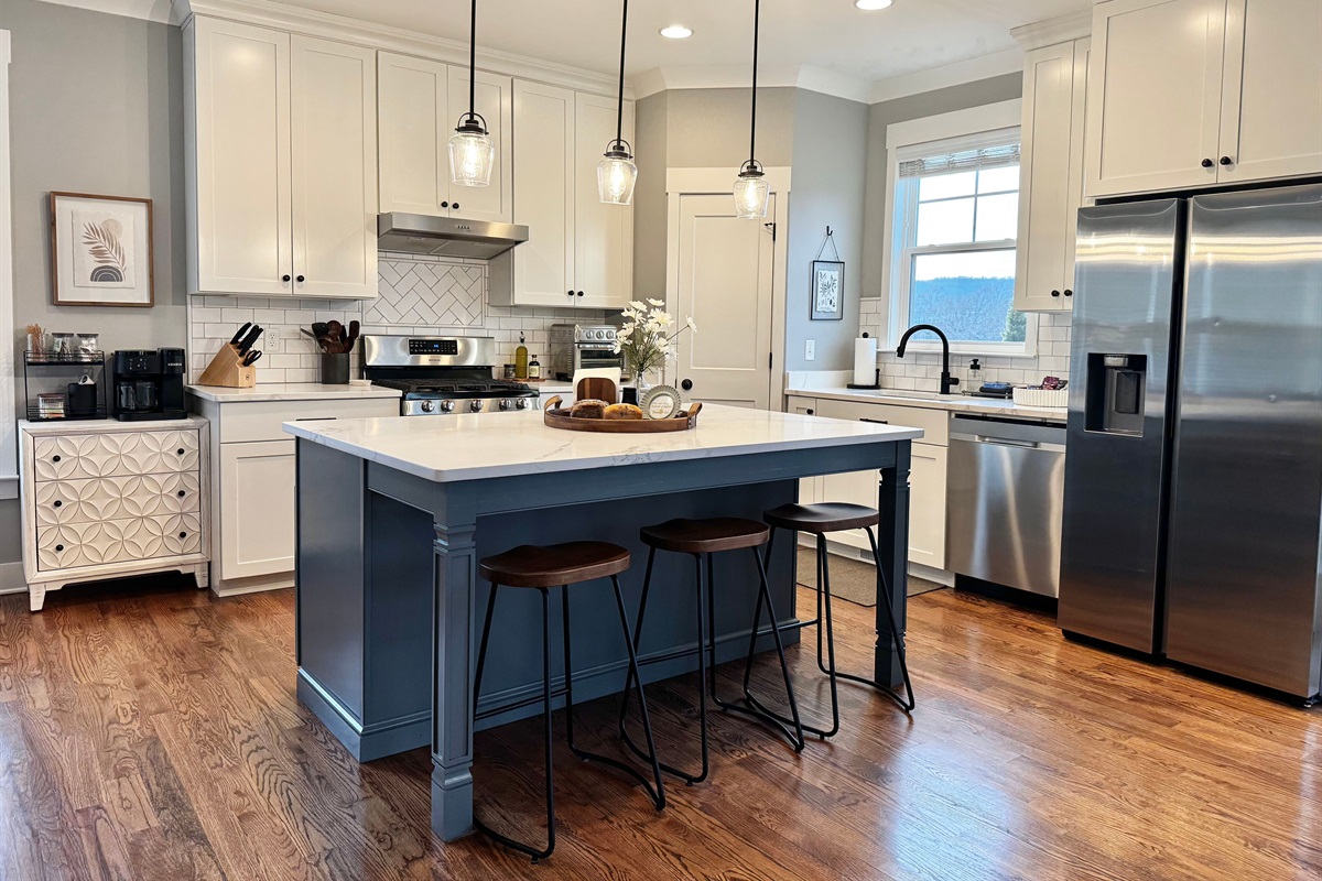 Fully equipped kitchen that is ready for cooking, baking, and entertaining your group.