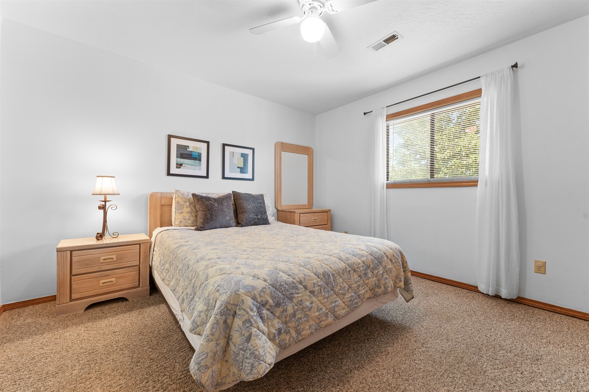 The second queen bedroom gives guests a quiet, comfortable retreat at the other side of the condo.