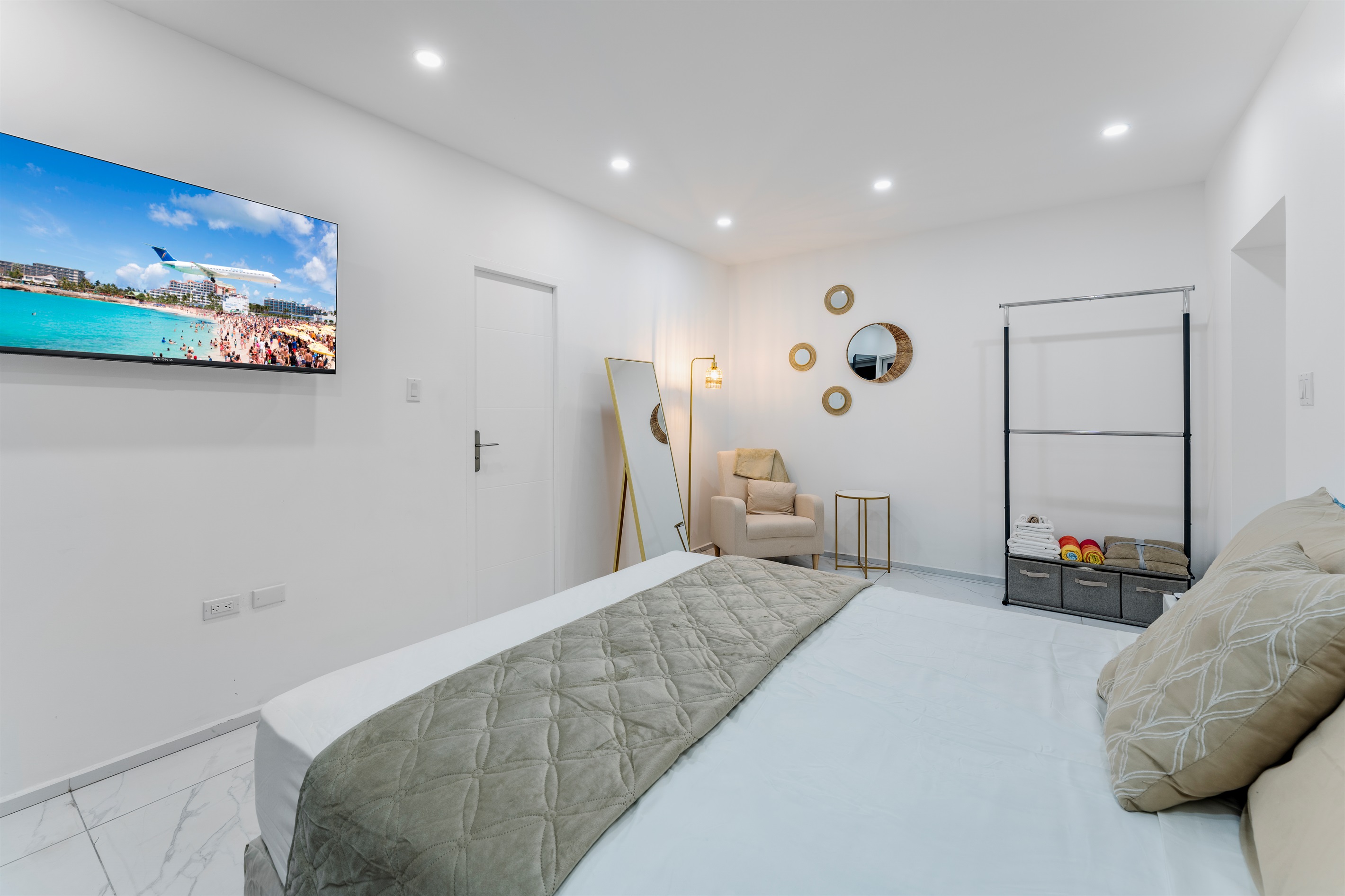 Second bedroom: View toward seating nook and open closet