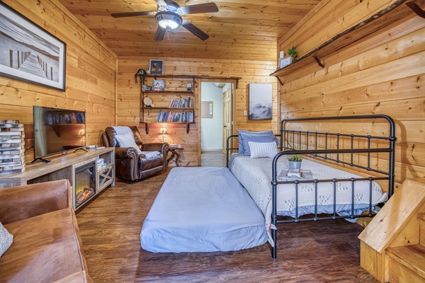 Pull out twin trundle, extra bedding provided