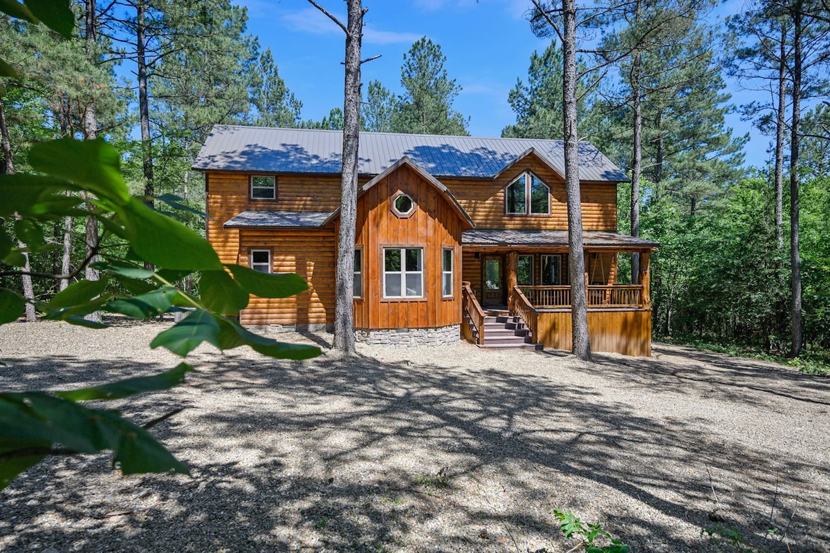 A peaceful escape with beautiful landscaping, forest views, and outdoor adventure just steps away.
