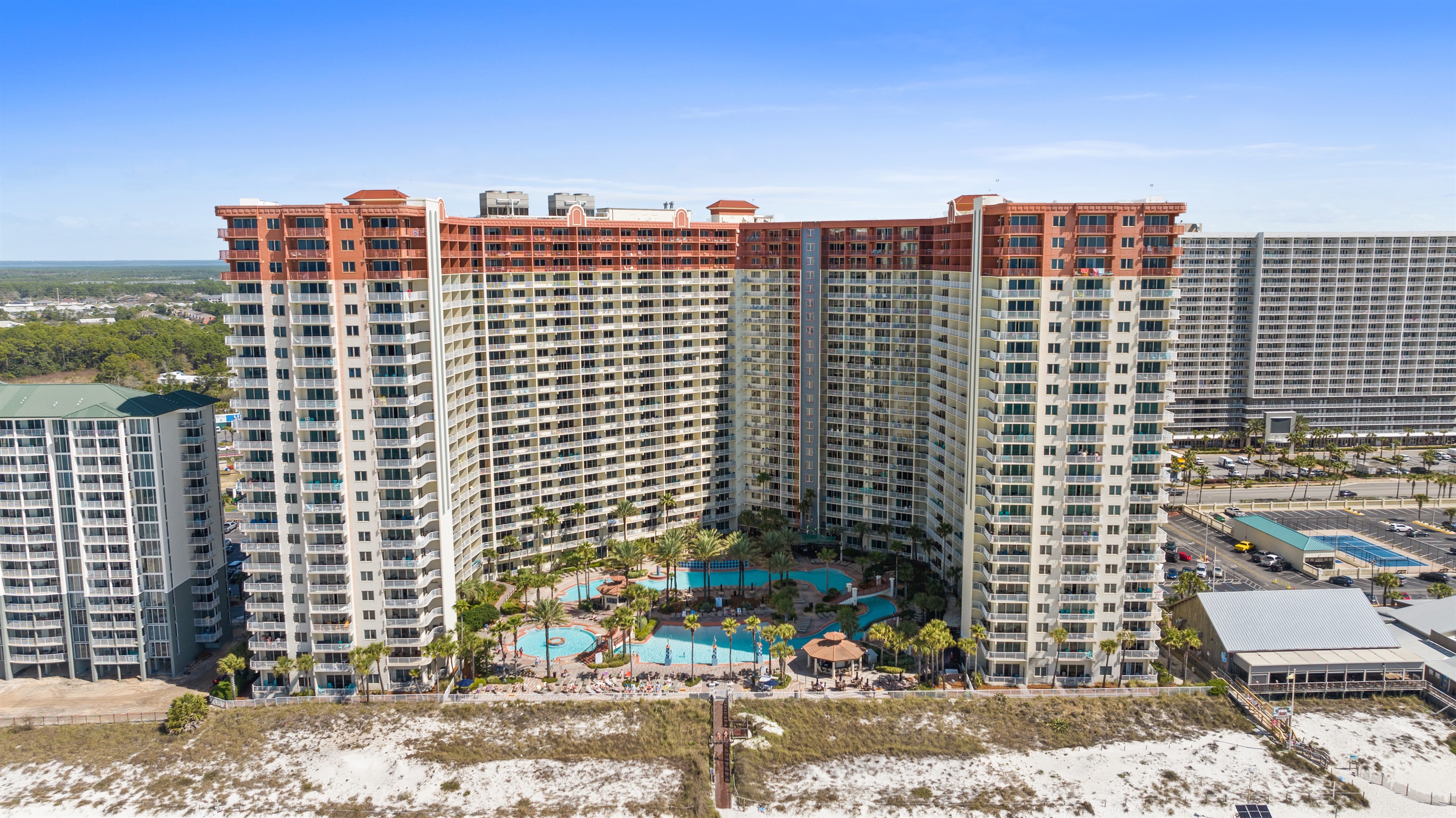 View of the back of the resort on the beach. Pineapple Willie's on the right.