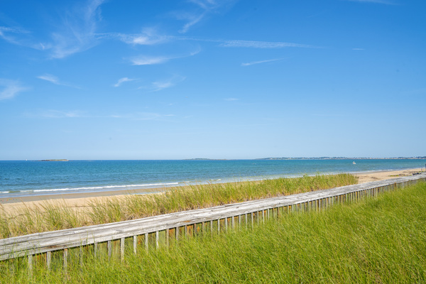 Miles of sandy shoreline and sparkling blue water set the scene for unforgettable beach days.