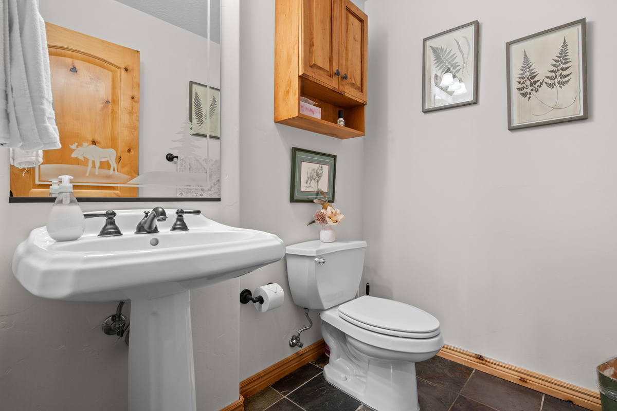 A convenient main-level half bath adds extra comfort and functionality for guests during your stay.
