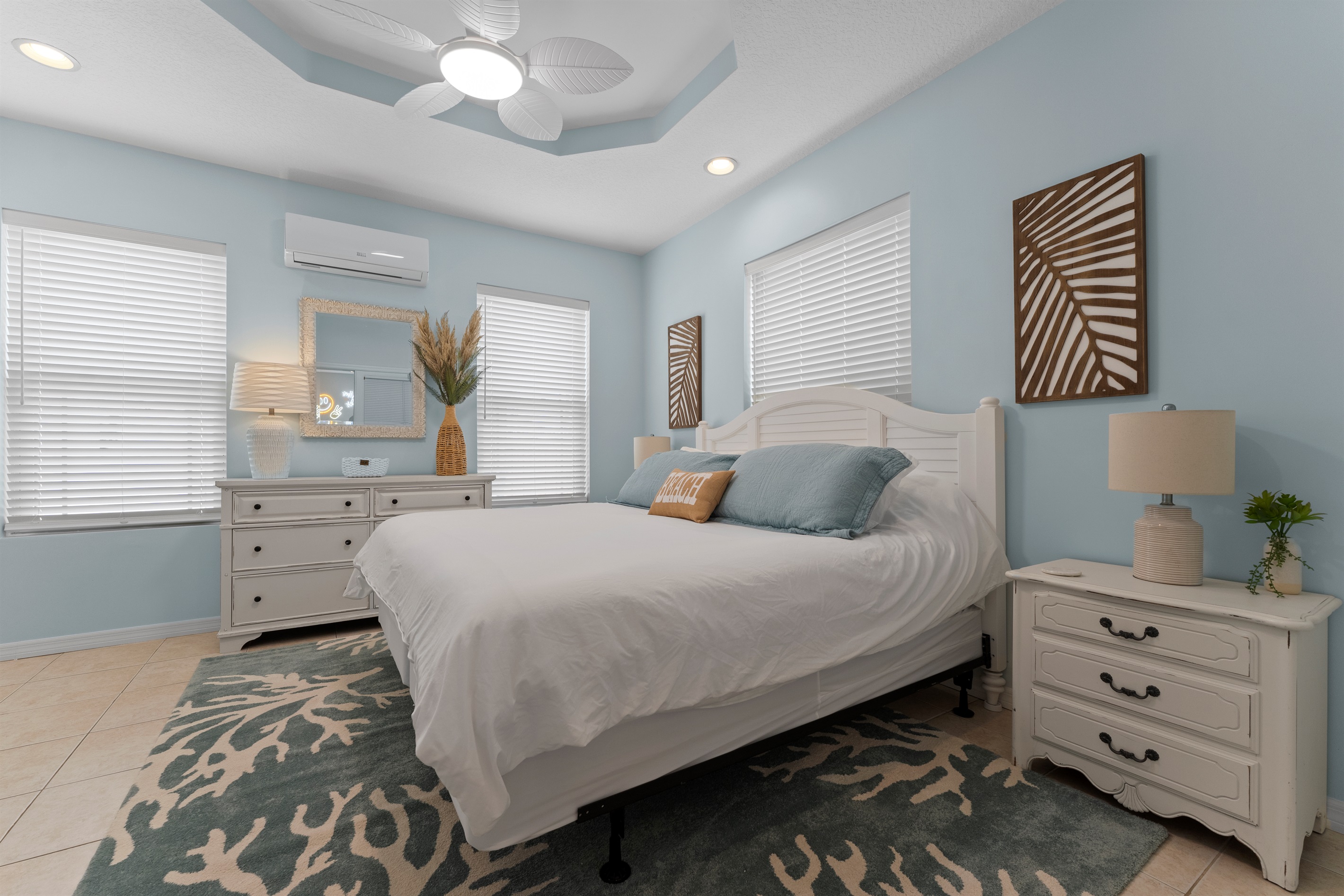 Main Floor King Bed, dresser, double nightstands, smart TV and closet for a comfortable stay.