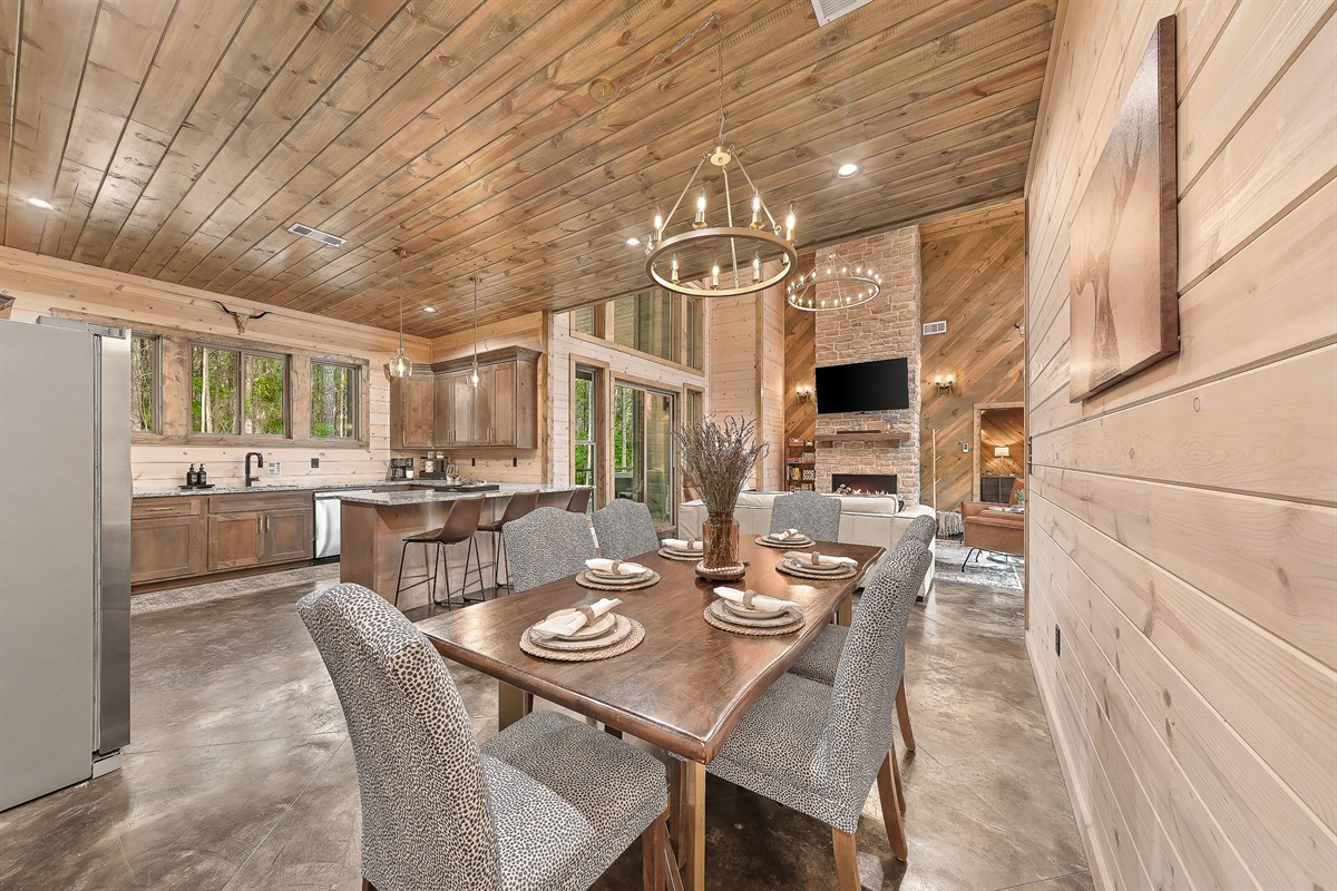 Dining table sits 6 and kitchen bar sits 3.