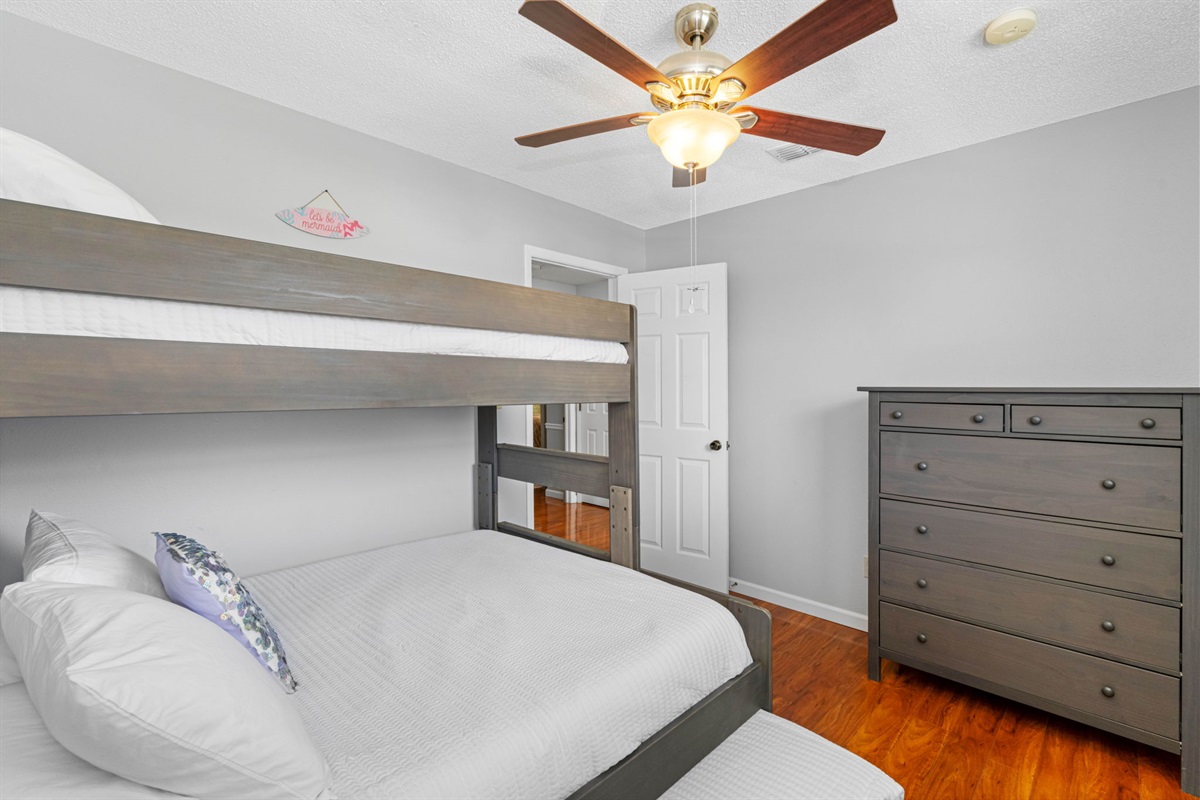 Twin XL over Queen bunk with Twin XL trundle — ideal for a small family or kids sharing a room.