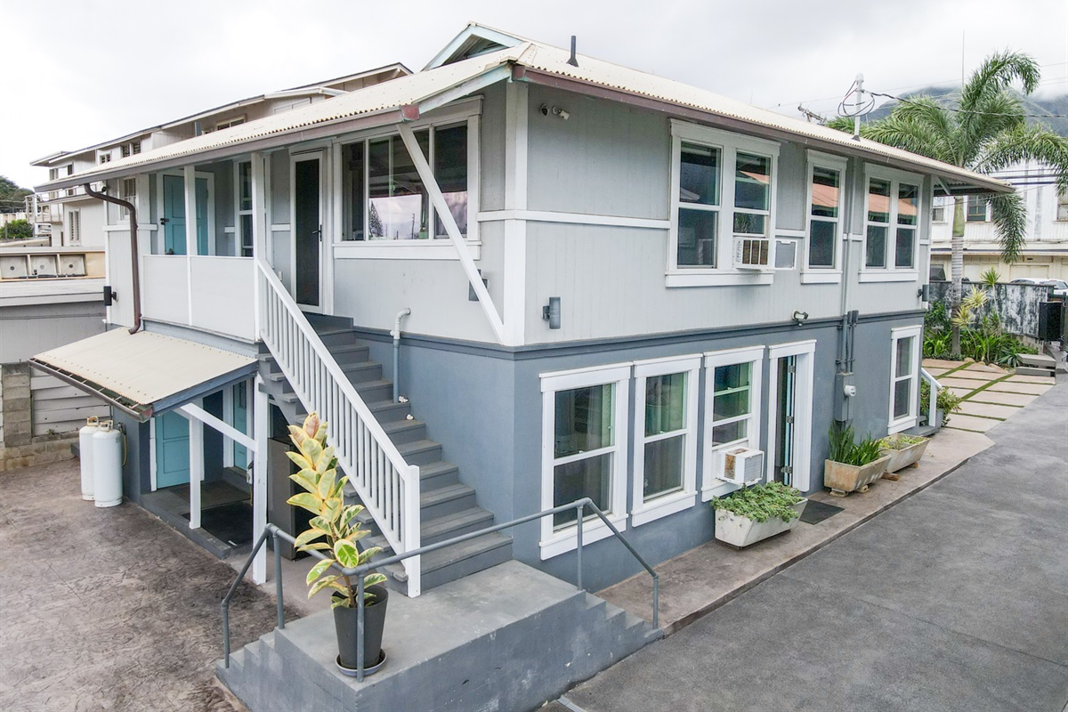 Entry stairs to Unit D are at back of unit