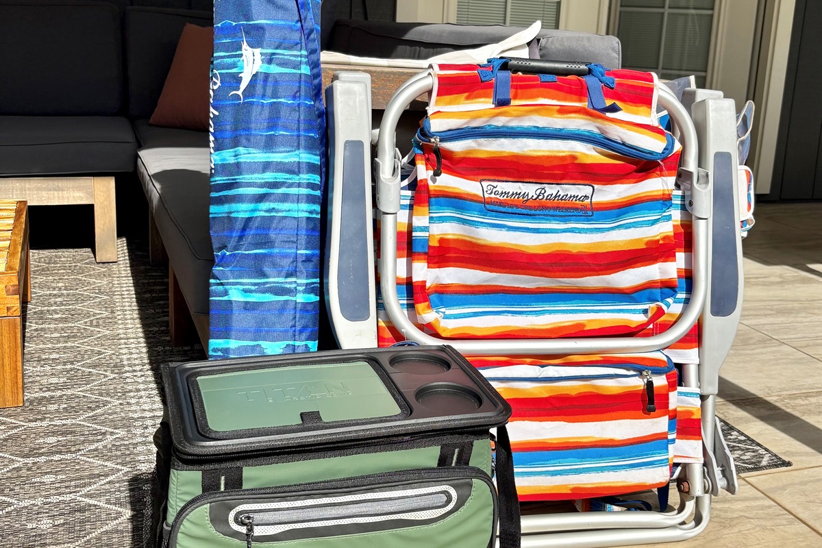 beach chairs, umbrella, and cooler included