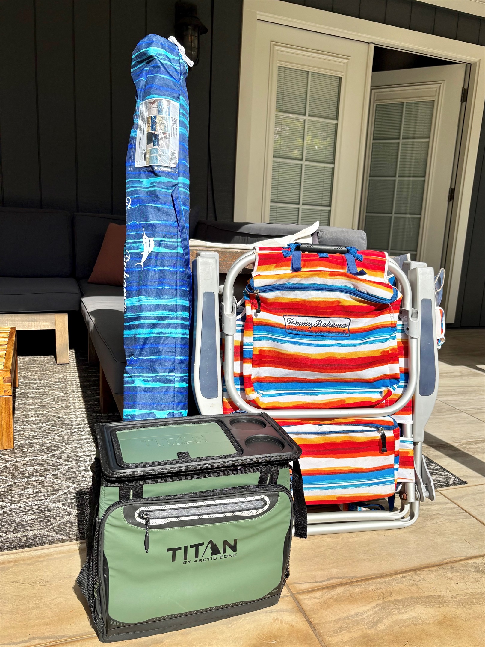 beach chairs, umbrella, and cooler included