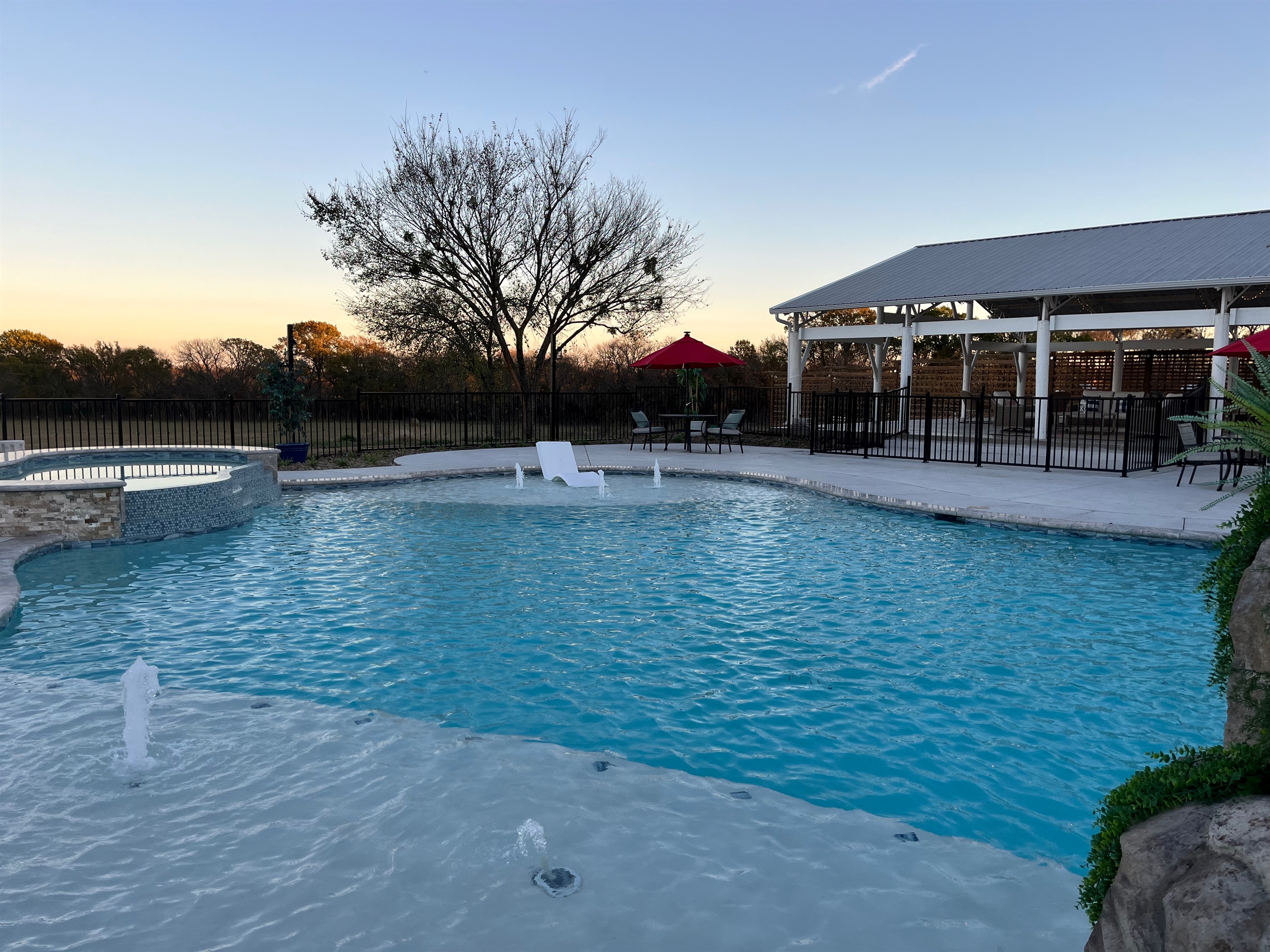 Take a sunset swim in the giant pool