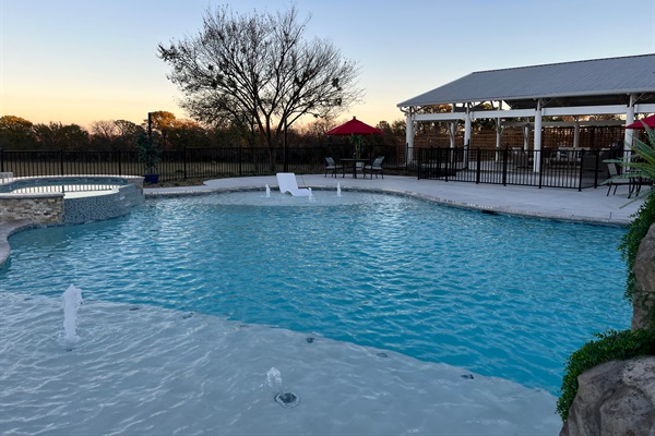 Take a sunset swim in the giant pool