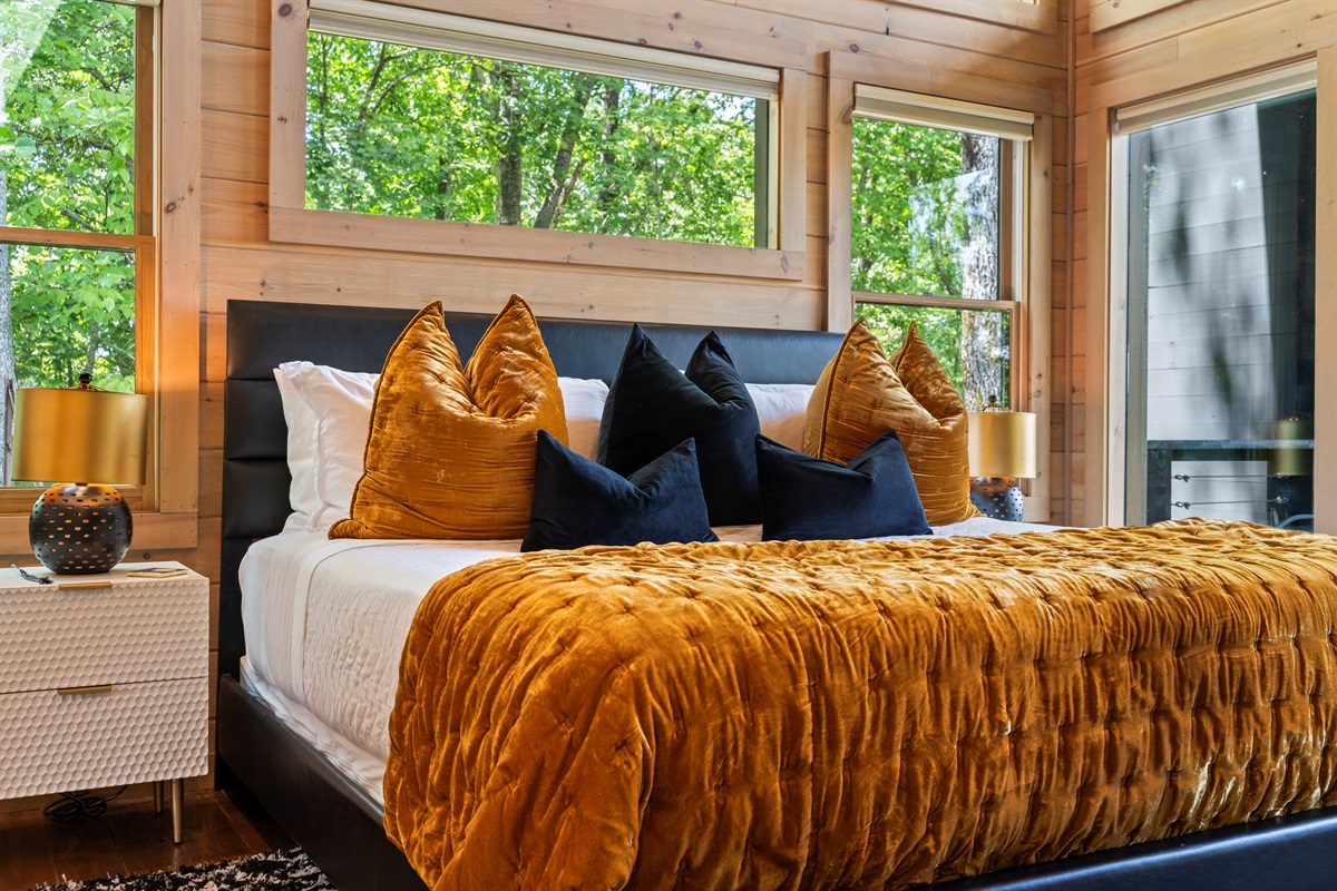 Oversized windows that fill the space with natural light and breathtaking views of the outdoors.