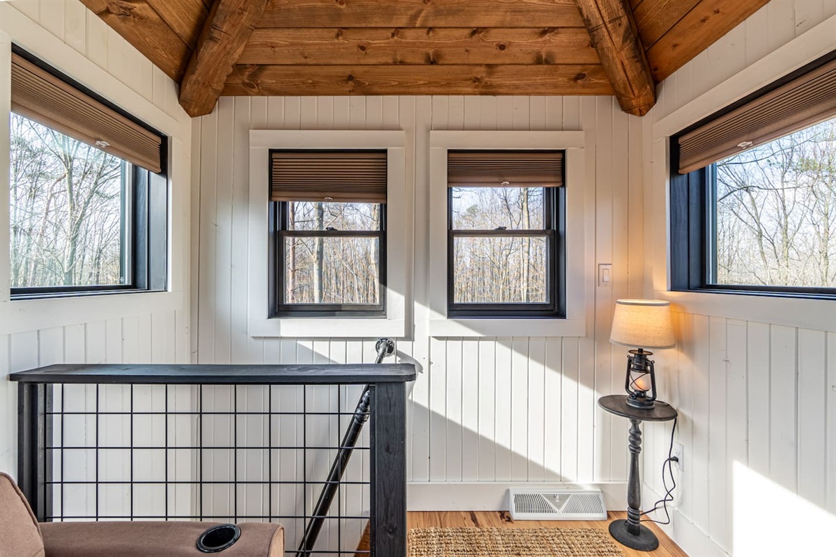 Third story lookout tower. This futon pulls out into a twin bed.
Please note: the only access is by the ships ladder.