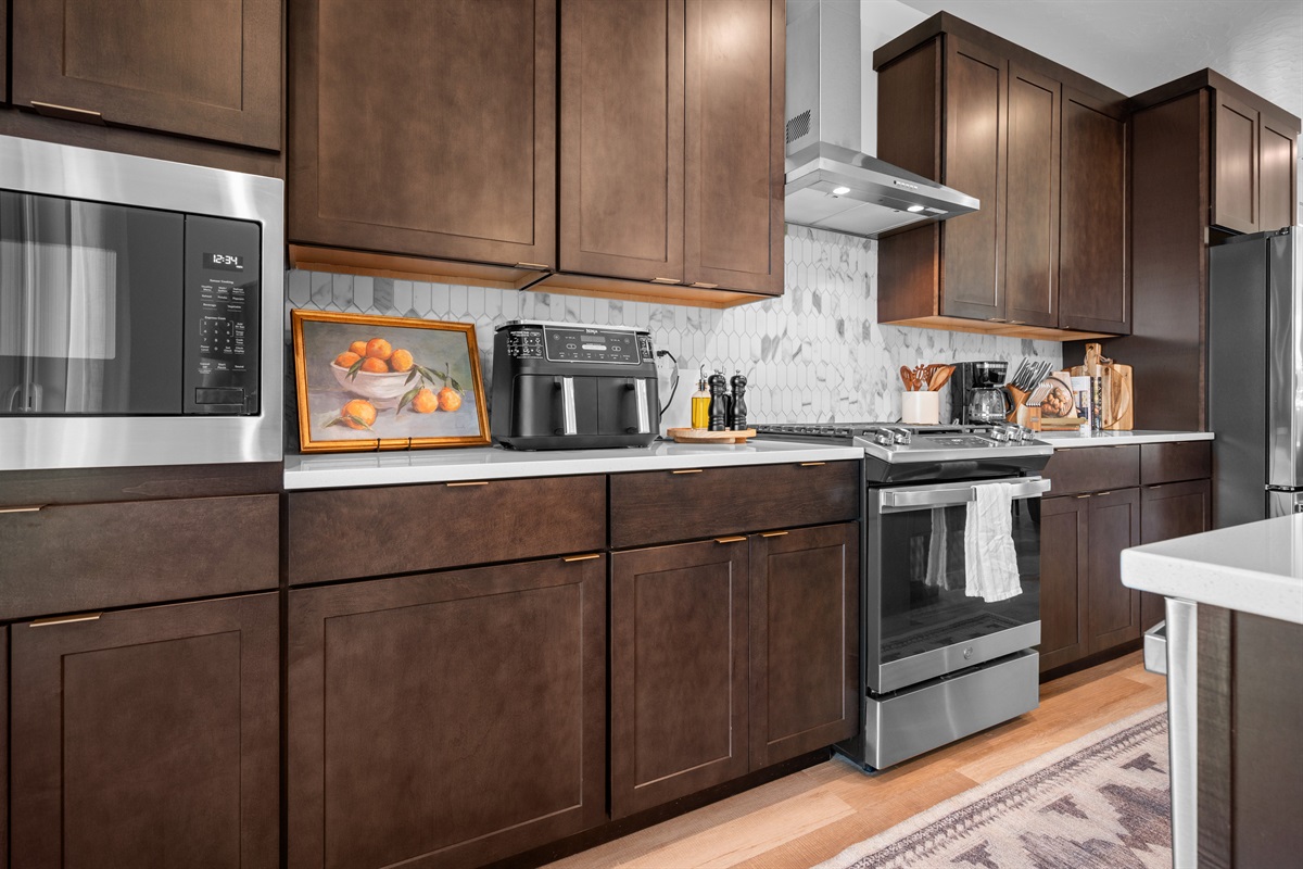 Fully equipped with stainless steel appliances, premium cookware, and everything you need to create delicious meals at home.