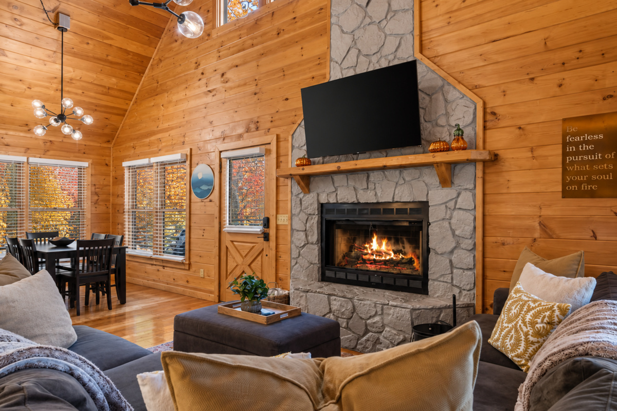 Inside, wood and warmth embrace you... the living room feels like home, only better.
*Indoor Fireplace (Seasonal Use October - April)