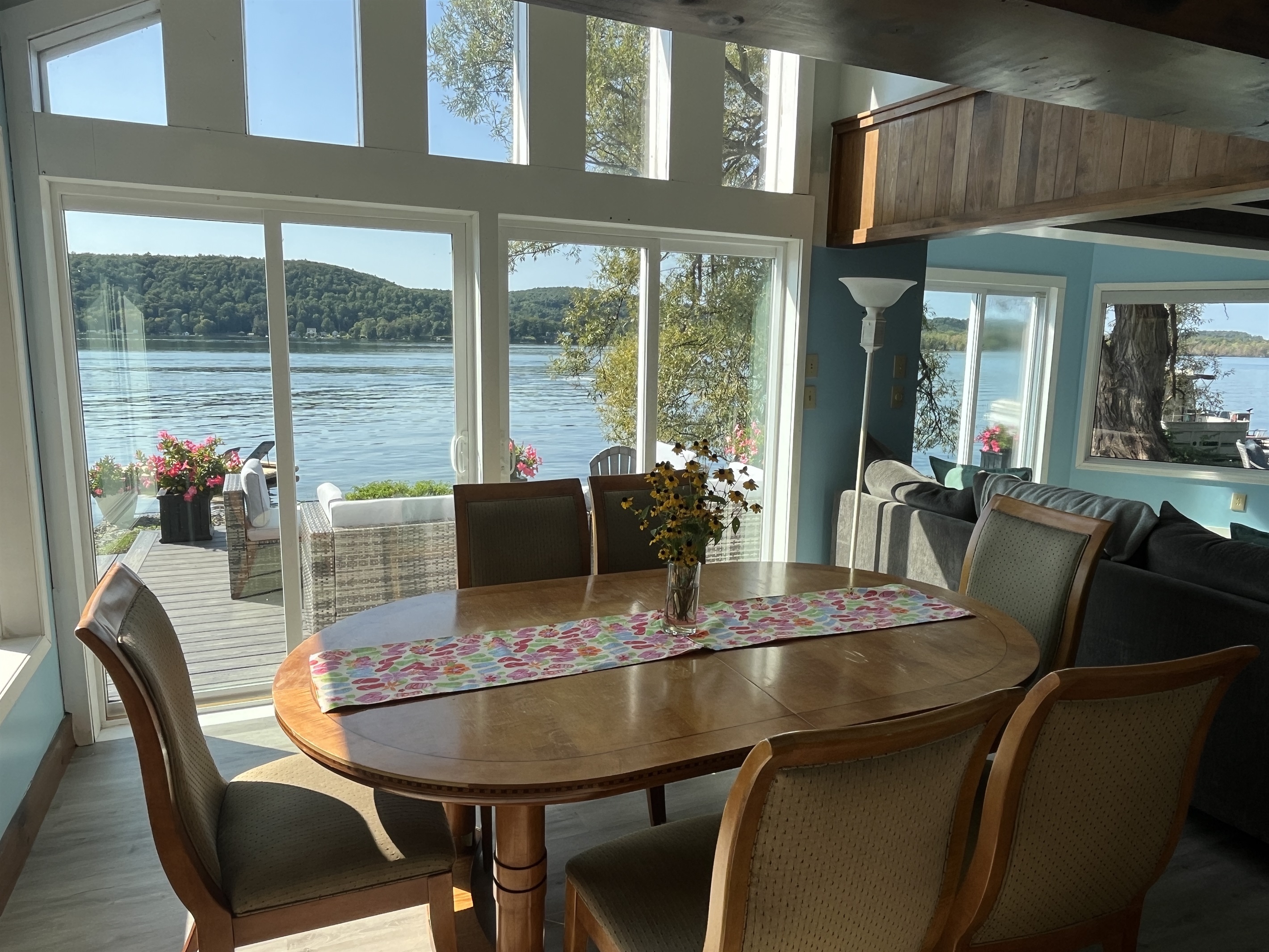 Bright and beautiful dining room overlooking the water
