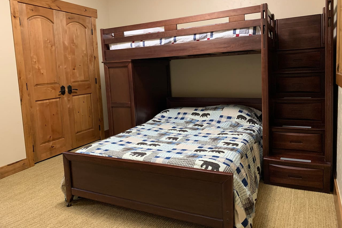 Bedroom 5: basement bedroom with full bed on bottom and twin bed on top
