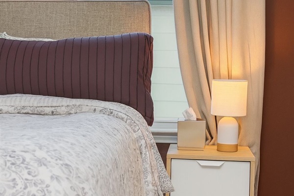 bedroom 1: hotel level comfy queen bed,TV,  ensuite full bath, closet, working table, dresser, ensuite full bath