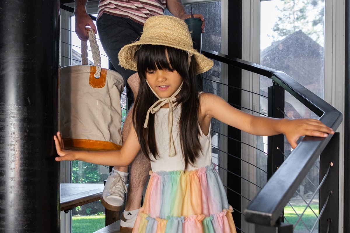 Beautiful spiral staircase separates the main living area from the bedrooms on the main floor.