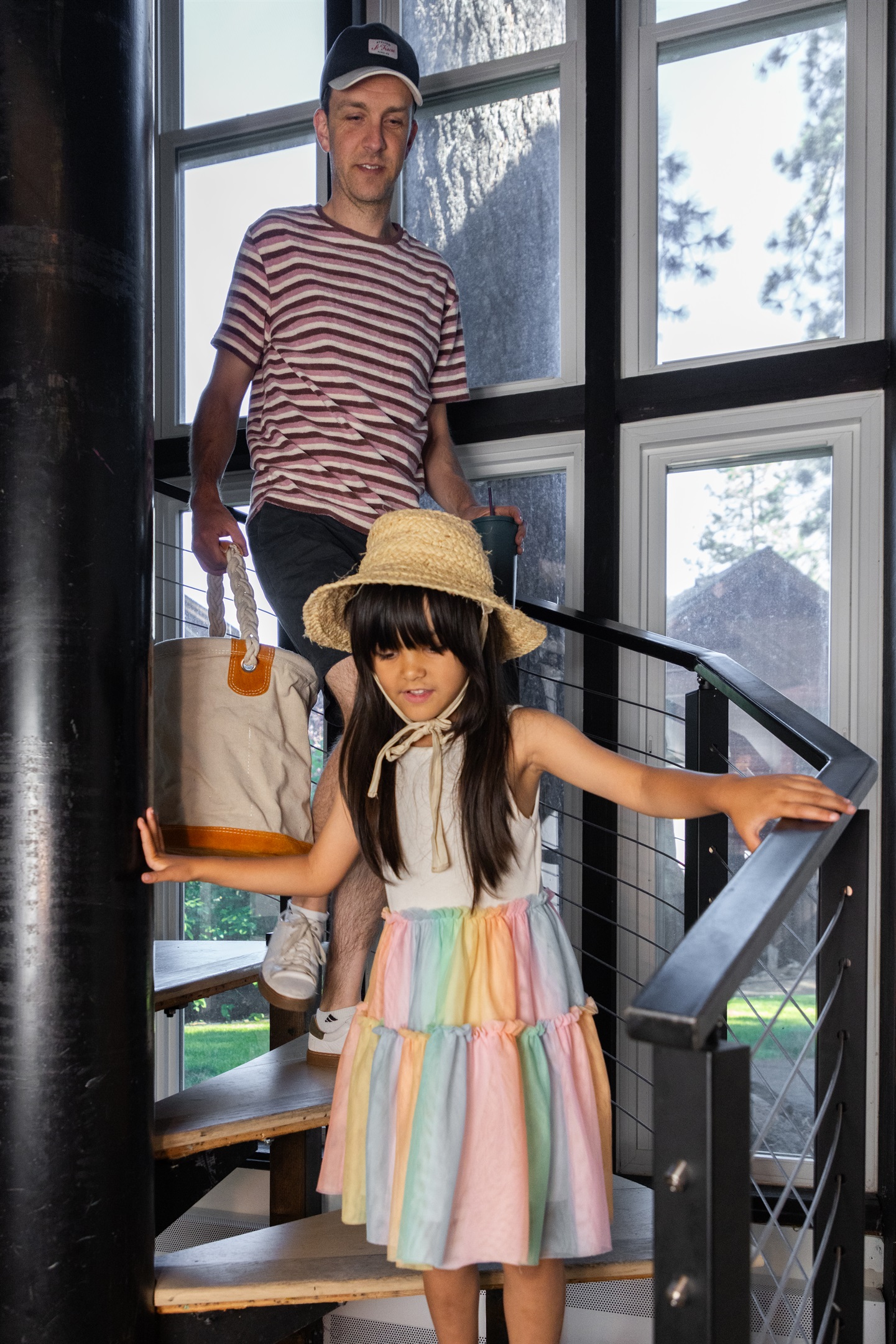 Beautiful spiral staircase separates the main living area from the bedrooms on the main floor.