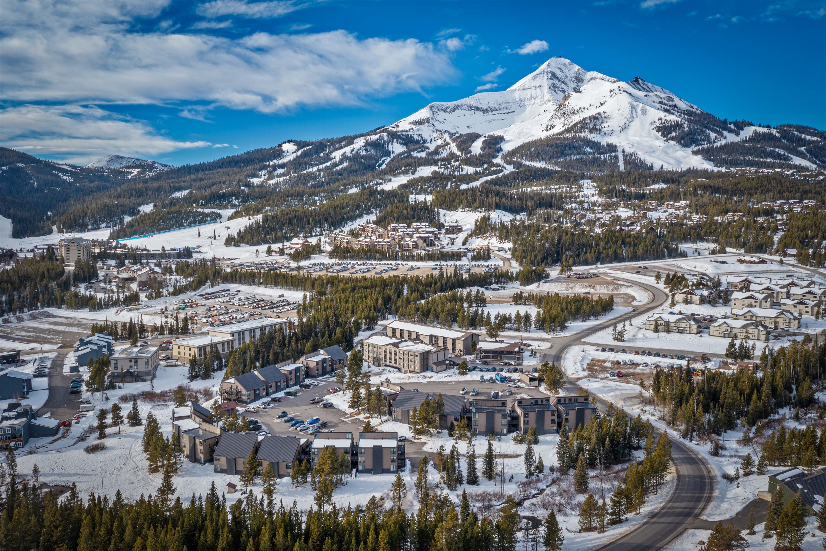 The Hill Condos is in the heart of Big Sky's Mountain Village with views of Lone Peak as your backdrop