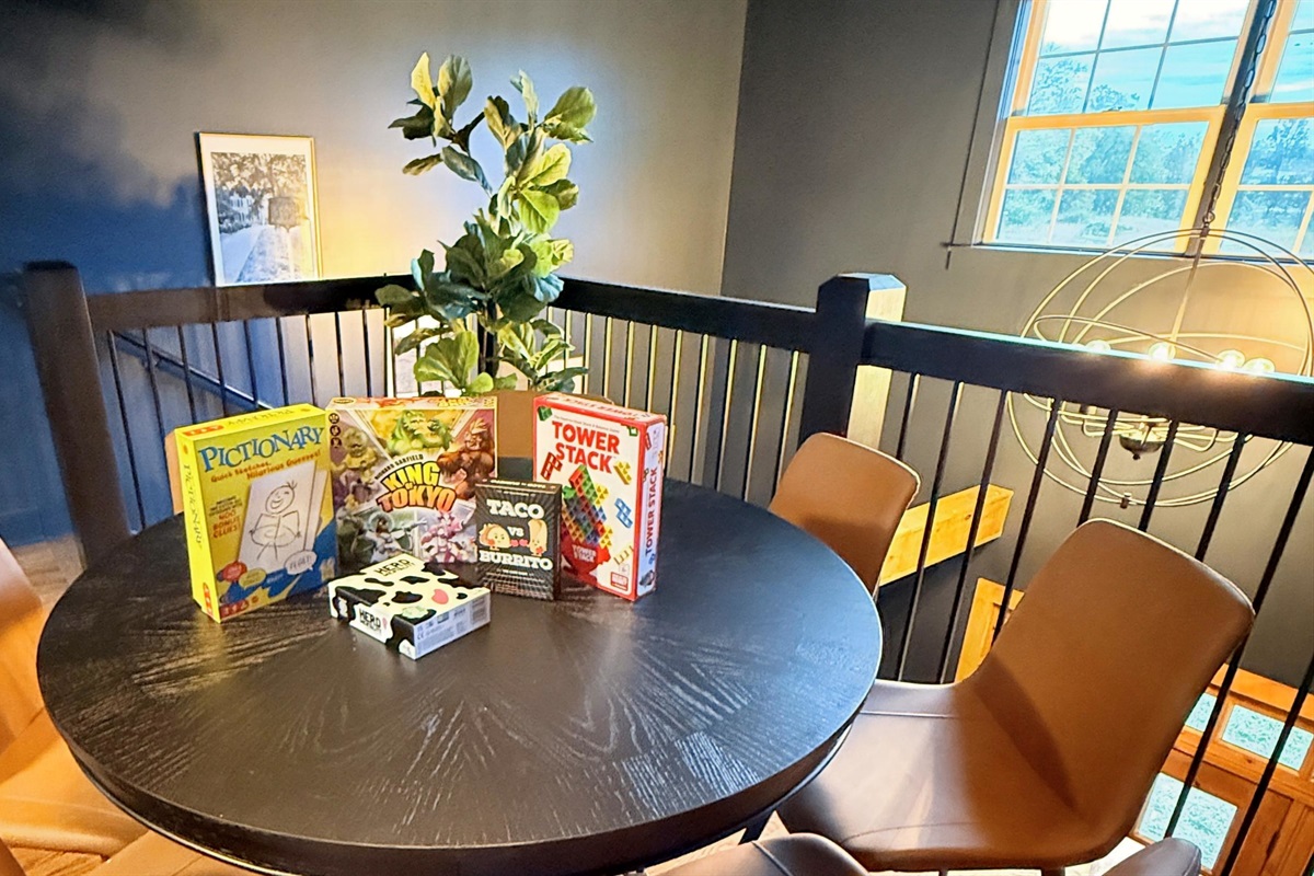 A table with the poker top removed is perfectly made for board games, bourbon flights, and midnight conversations.
