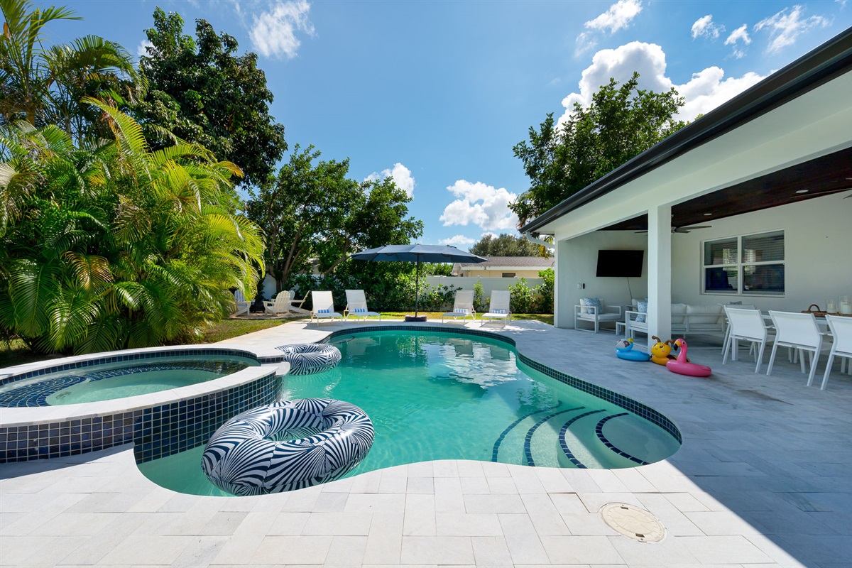 From pool floats to playground fun, this backyard has something for everyone.