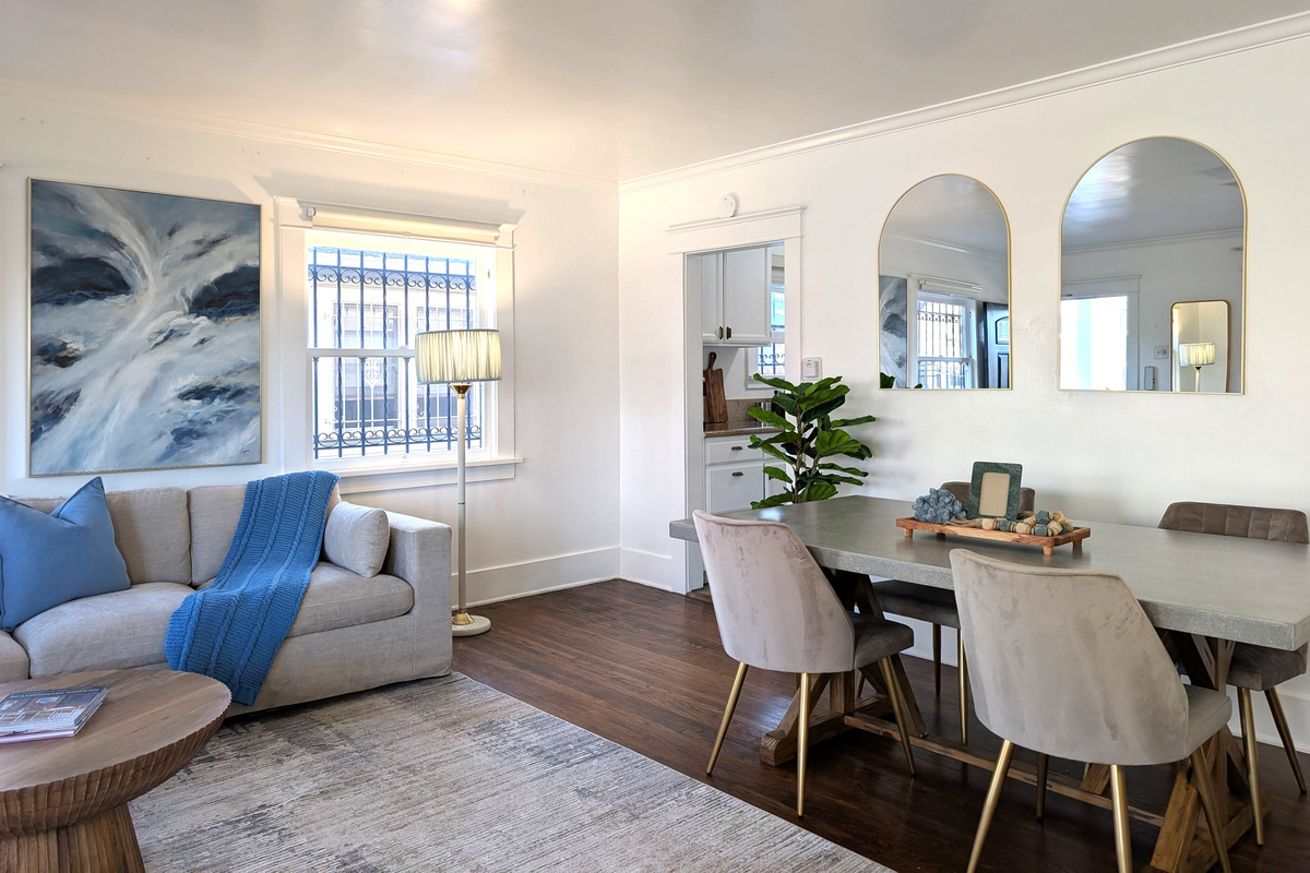 🏡 Gather, relax, and make memories in this bright, open-concept living and dining area designed for comfort and connection.