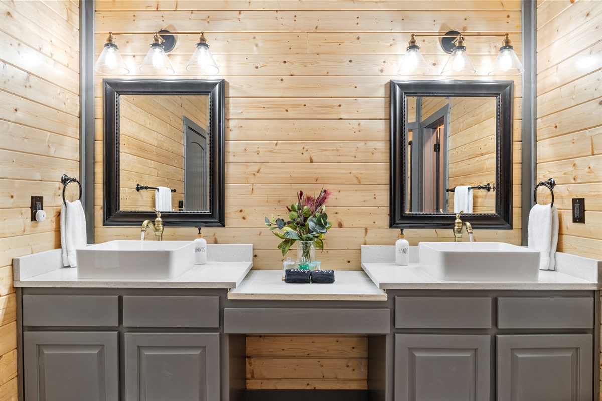 Yellowstone bathroom: ample counter space, dual sinks for convenience, spacious closet for organizing all of your belongings.