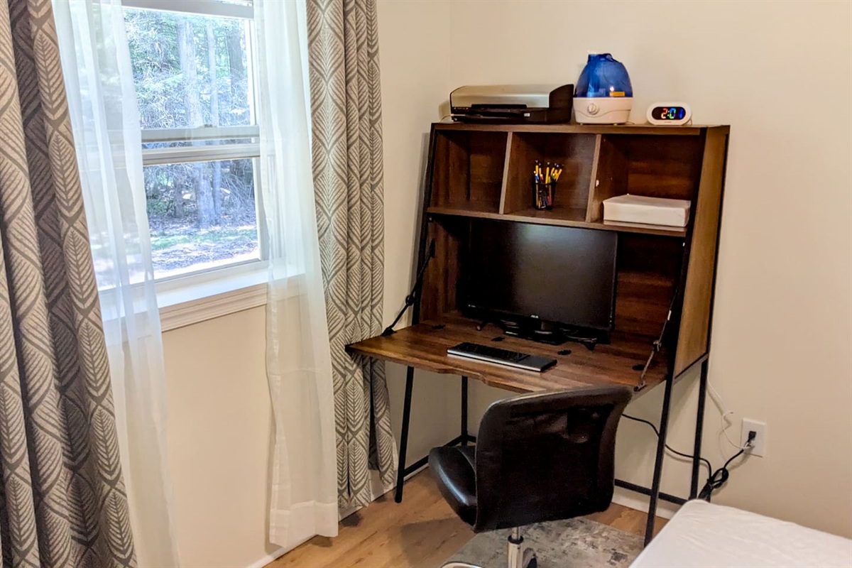 Plug in to the large screen monitor and keyboard, desk folds up for more space!