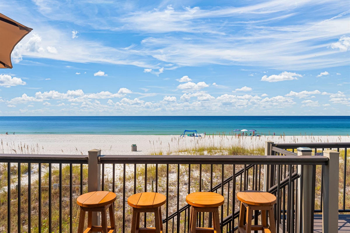 Your own private boardwalk straight to the sand — with an outdoor shower to rinse off after the waves.
