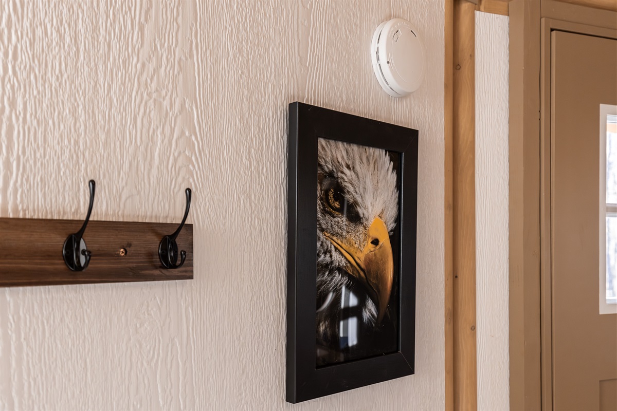 Thoughtful entry details and eagle-inspired artwork set the tone the moment you arrive.