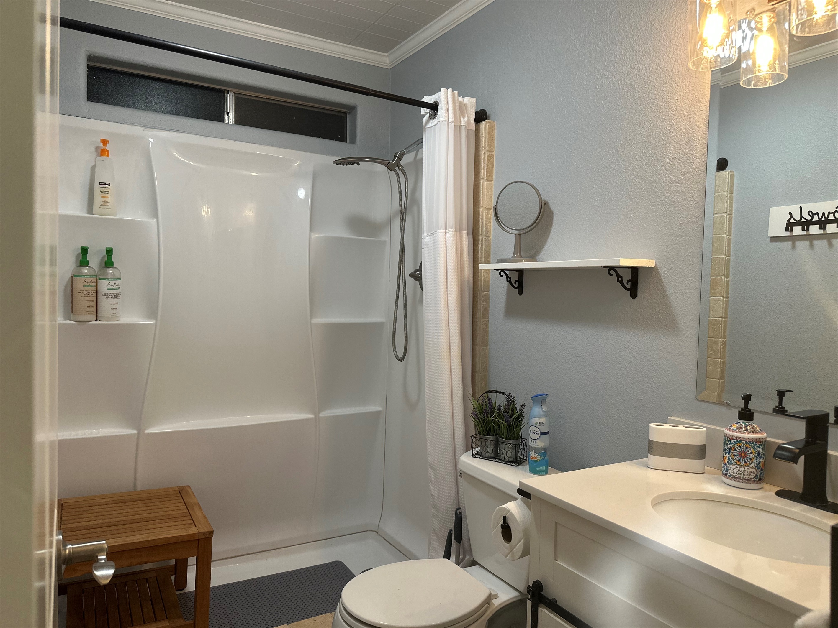 Hallway Bathroom with walk-in shower