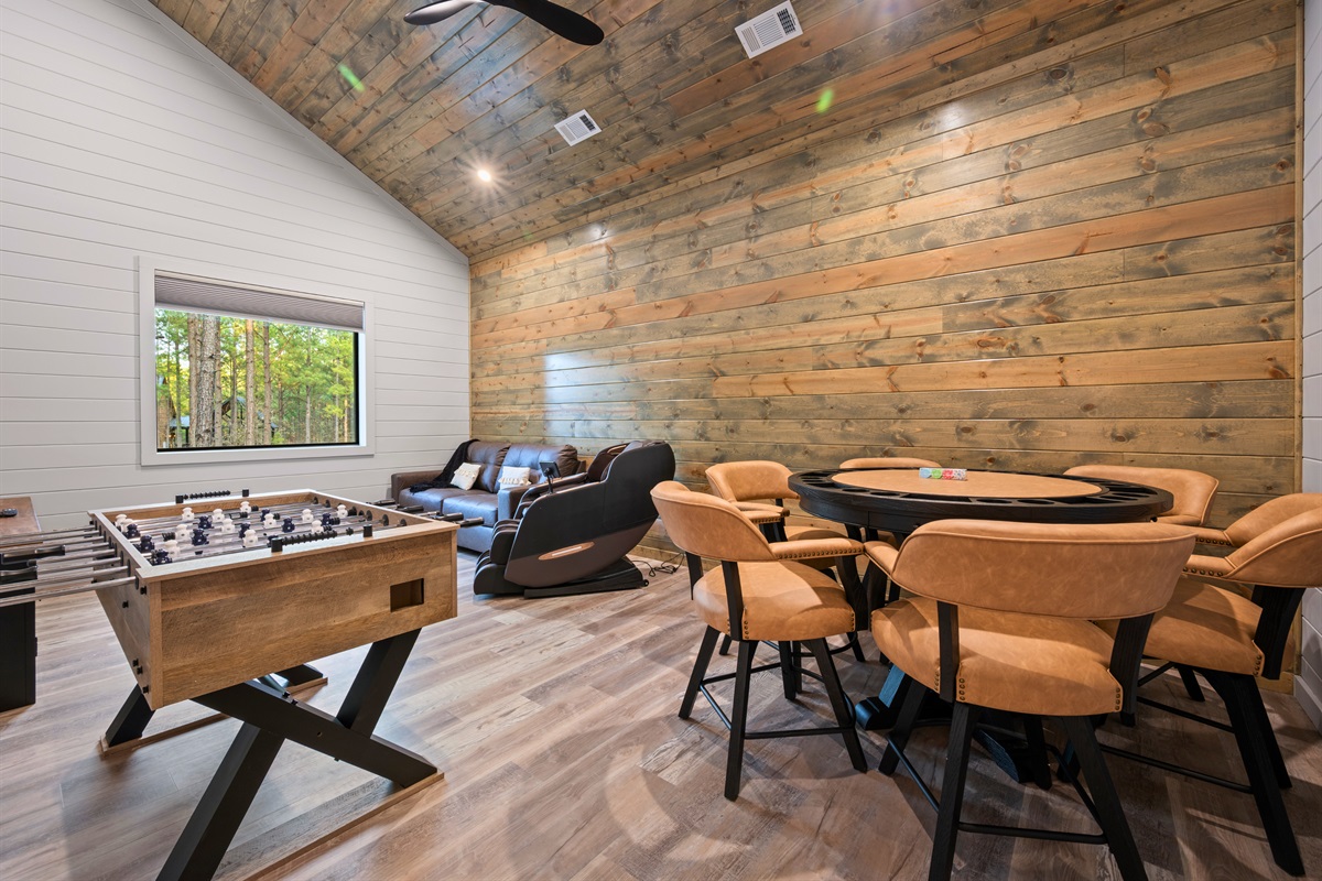 With comfortable seating and a spacious layout, this entertainment area is perfect for board games, conversation, or simply hanging out.