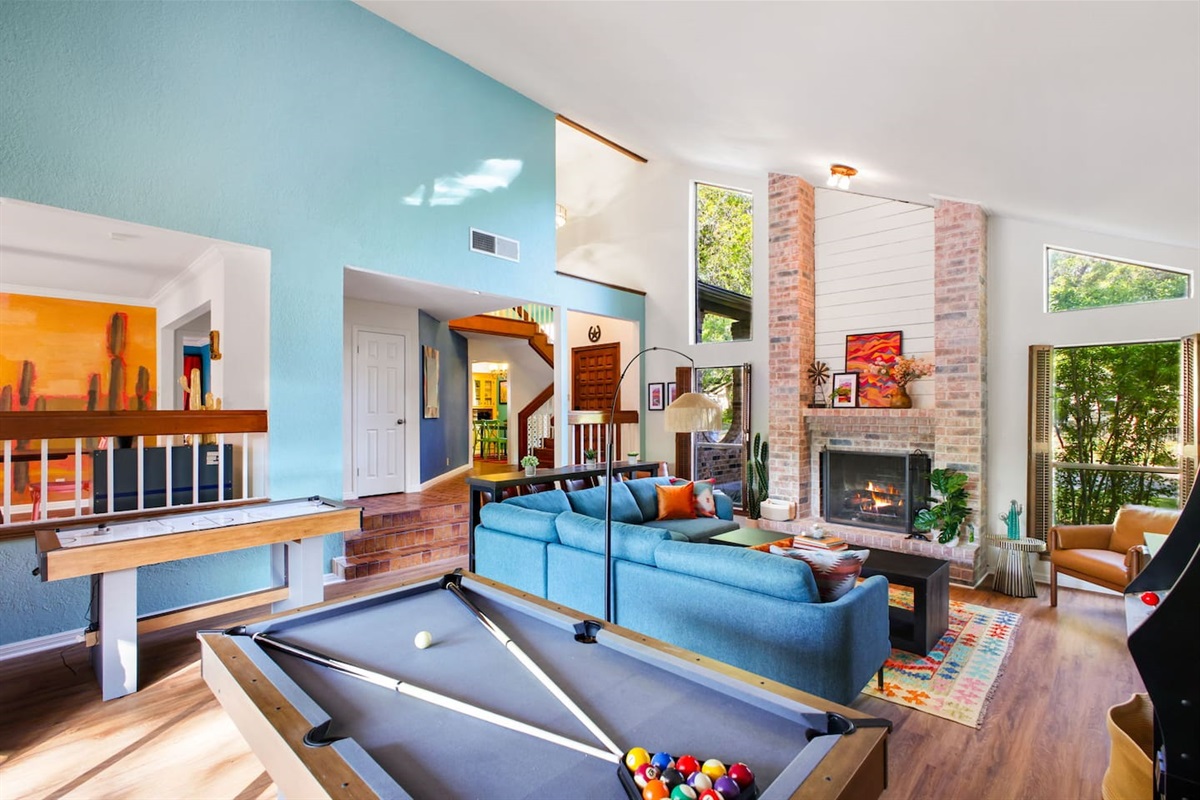  Spacious living area with arcade, pool table, and plenty of room to relax.