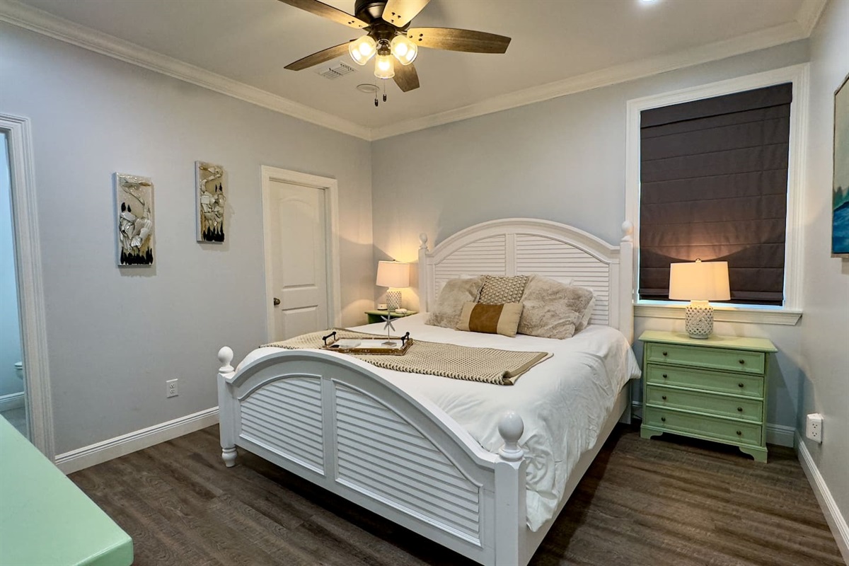 Relax and recharge in a bright, beachy retreat—complete with ensuite bathroom convenience.